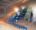 loading grain into a truck with a PZM-120 grain thrower, photo